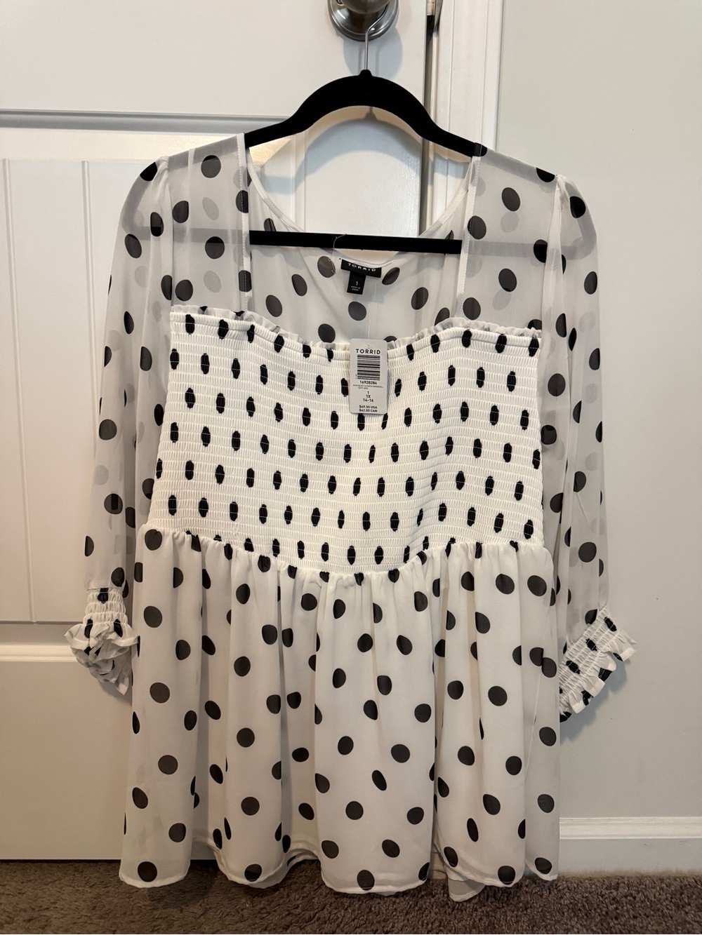 torrid White Polka Dot Smocked Peplum Tunic